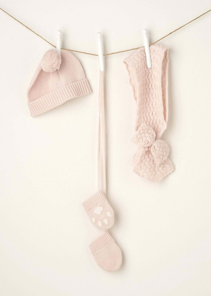LIGHT PINK BABY HAT, MITTEN AND HEADBAND HANGING UP | TRULY LIFESTYLE