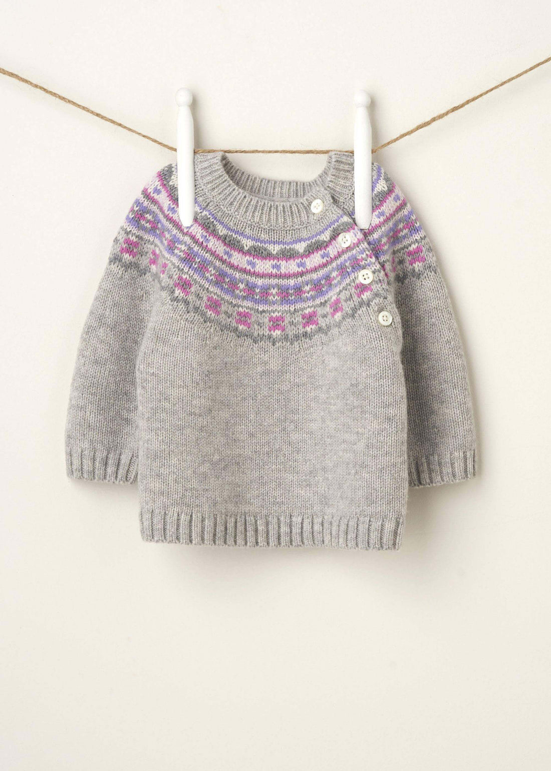 GREY FAIRISLE PRINT BABY JUMPER HANGING UP | TRULY LIFESTYLE