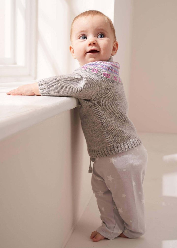 GREY FAIRISLE PRINT BABY JUMPER ON STANDING BABY | TRULY LIFESTYLE