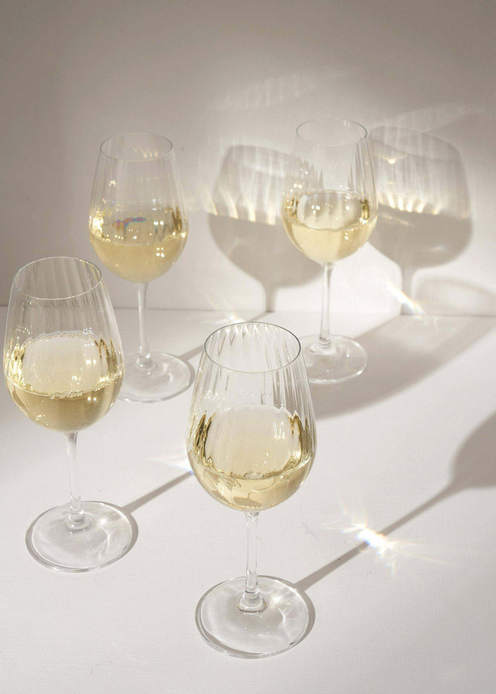 Fluted Crystal Set Of 4 White Wine Glasses Filled With Wine | Truly Lfiestyle