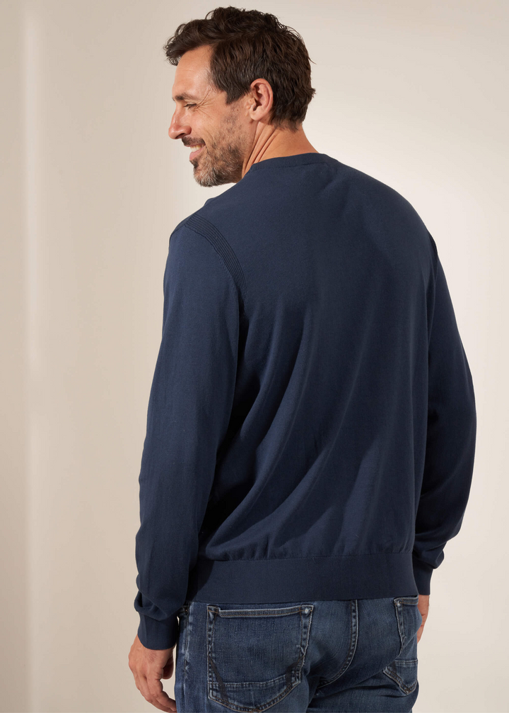 Truly Lifestyle Mens Midnight Blue Fine Knit Crew Neck Jumper On Model With Jeans From The Back