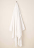 White Turkish Cotton Bath Towel Hanging Up | Truly Lifestyle