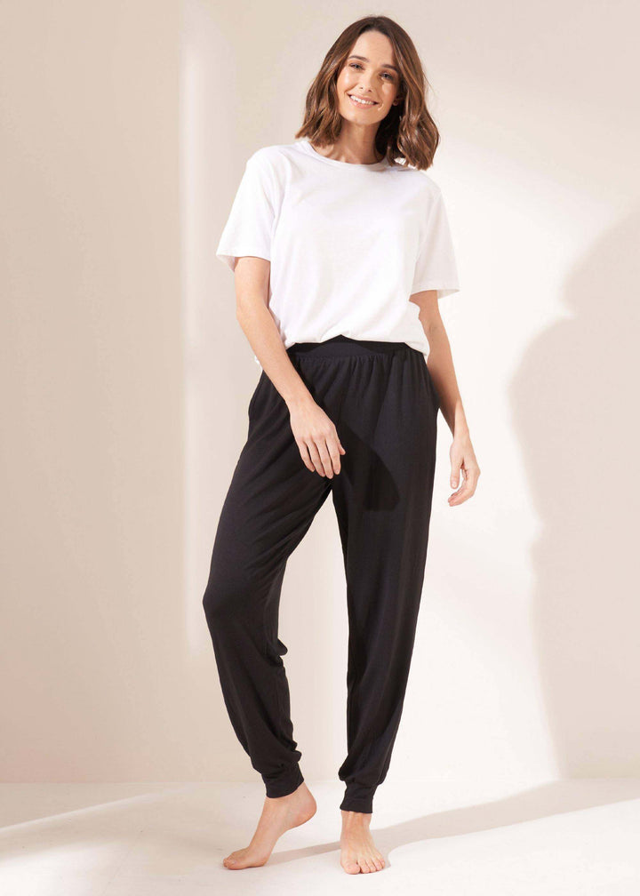 Womens Black Bamboo Hareem Jogging Bottoms On Model In White Tshirt | Truly Lifestyle