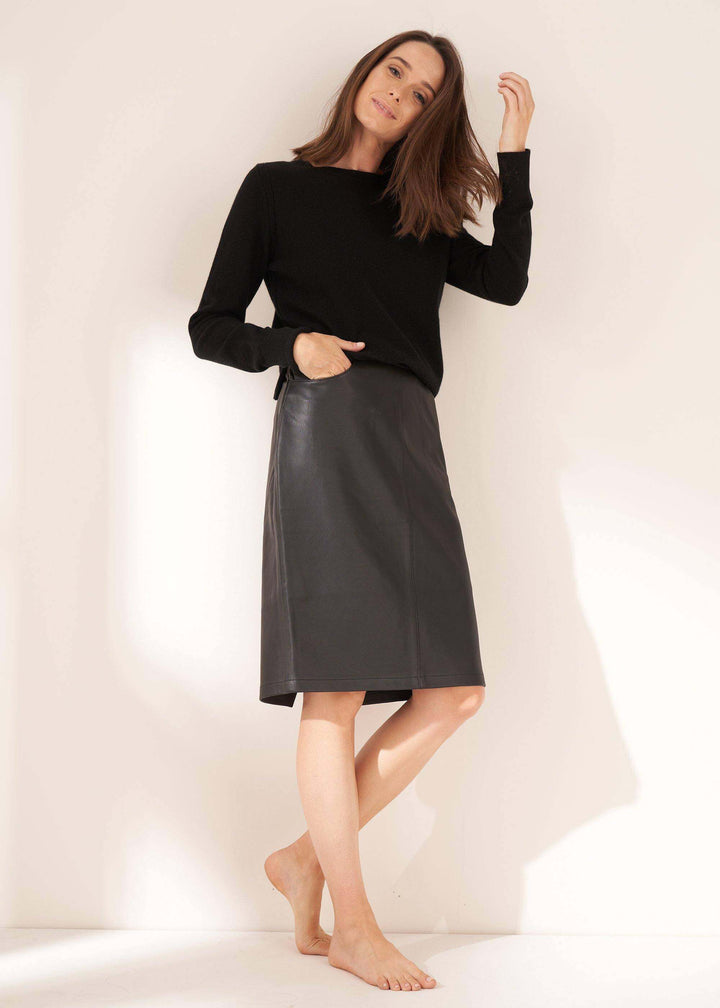 Ladies Black Leather Midi Skirt On Model Wearing Black Cashmere Jumper | Truly Lifestyle
