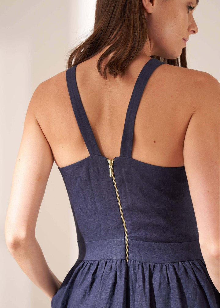 Navy Blue Womens Linen Dress On Model Showing Back Detailing | Truly Lifestyle