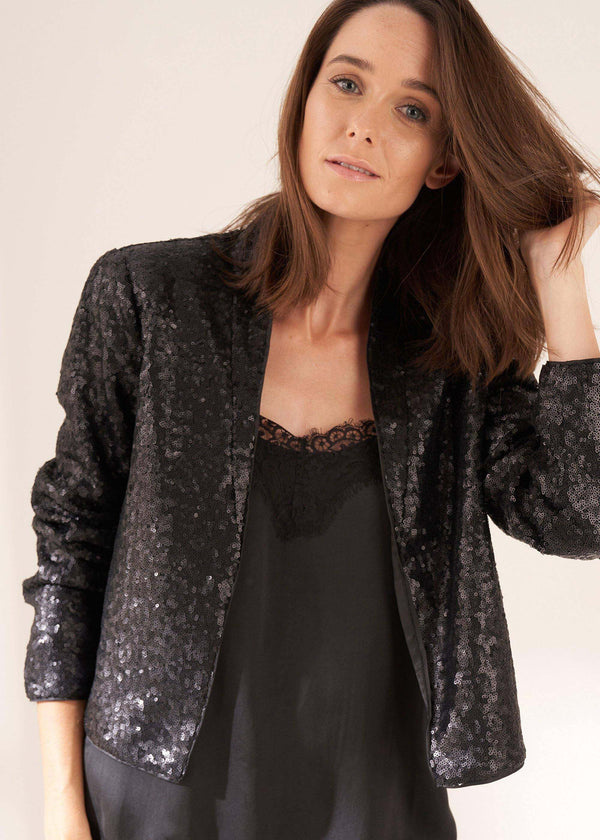 Womens Black Cropped Sequin Jacket On Model In Silk Camisole | Truly Lifestyle