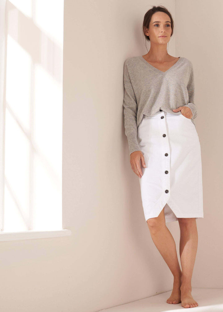 Womens Grey Cashmere V Neck Jumper On Model With White Denim Midi Skirt | Truly Lifestyle