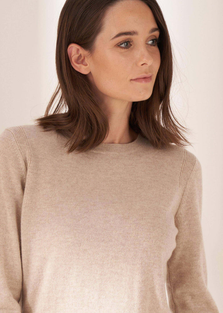Womens Oatmeal Cashmere Crew Neck Jumper On Model In Jeans Close Up | Truly Lifestyle